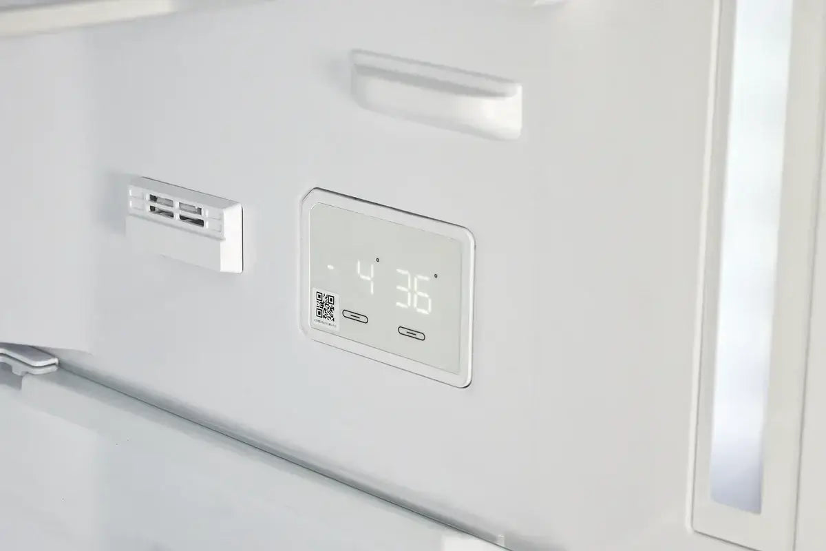 Interior of Unique 12 Cu/Ft 340L Classic Retro Bottom Mount Refrigerator by Cabin Depot, showing digital temperature display.