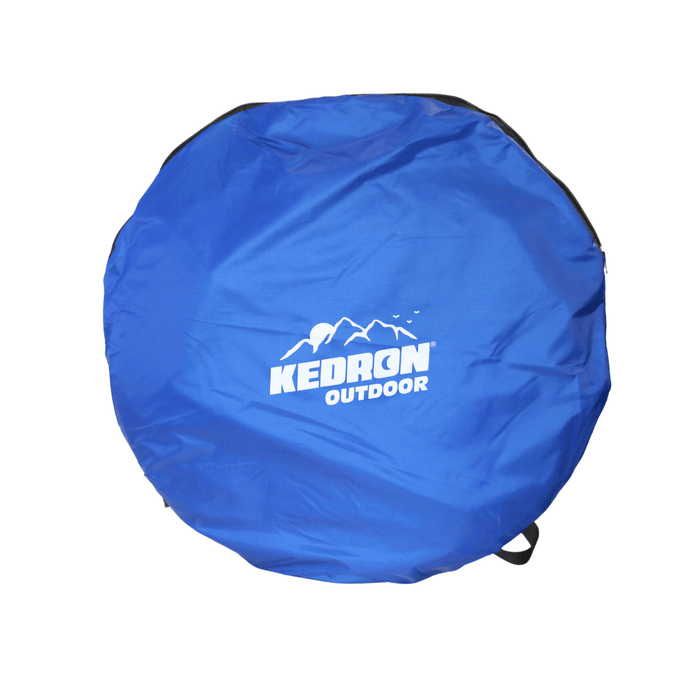 Kedron Outdoor pop up privacy shelter tent packed in a blue circular carry bag with logo.