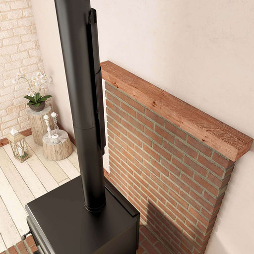 Modern stove pipe with brick wall and wood mantle in stylish living room.