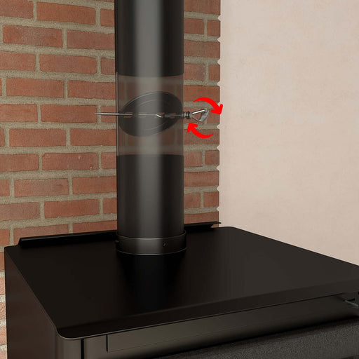 Cast iron damper installed in a 6" flue pipe with handle for regulating airflow, shown on a brick wall background.