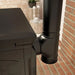 Black matte flue pipe with Imperial 6" round end cap on a stove setup against brick wall.