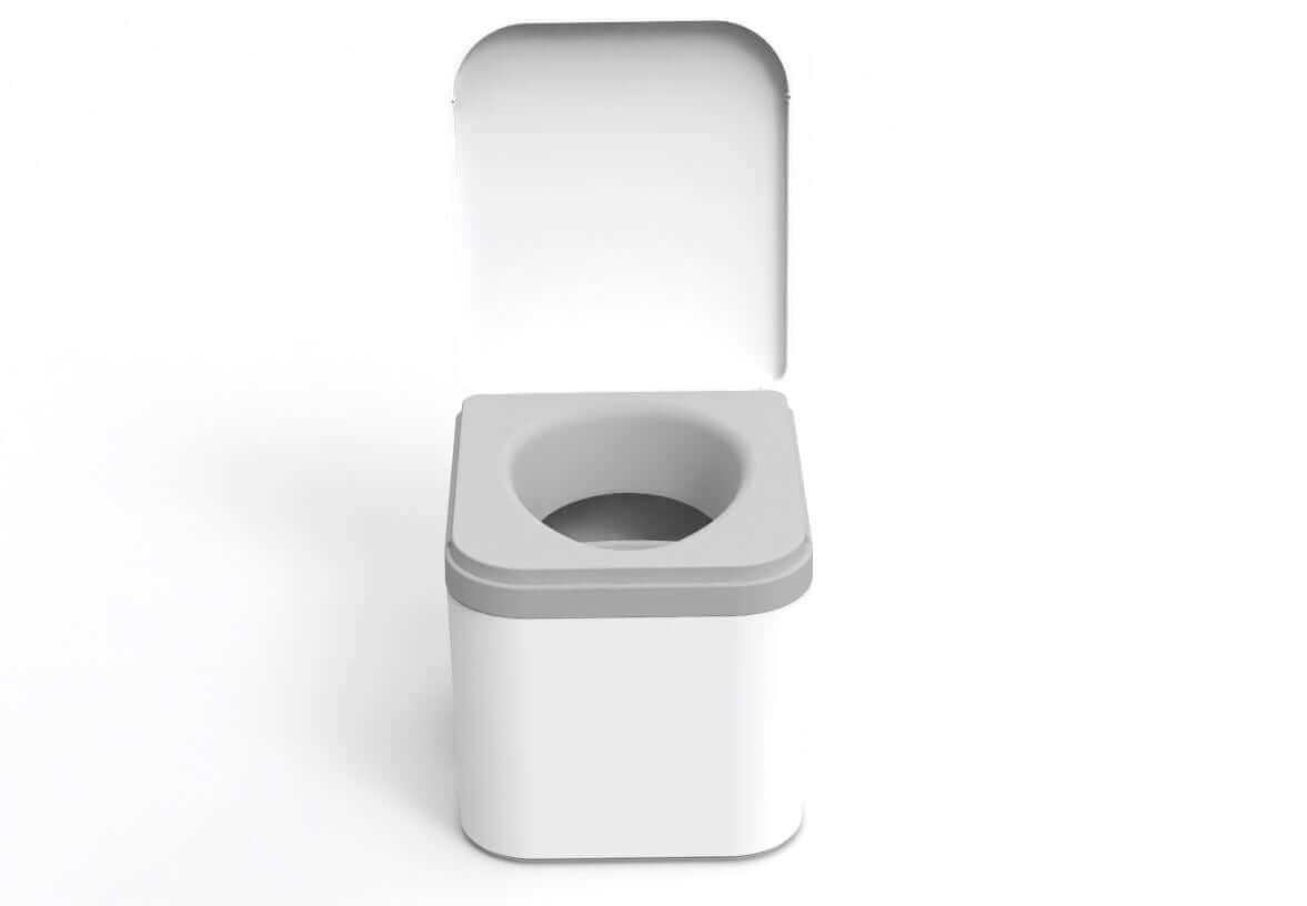 OGO Nomad compost toilet with urine-diverting bowl, sold by Cabin Depot. Simple, modern design for efficient waste separation.