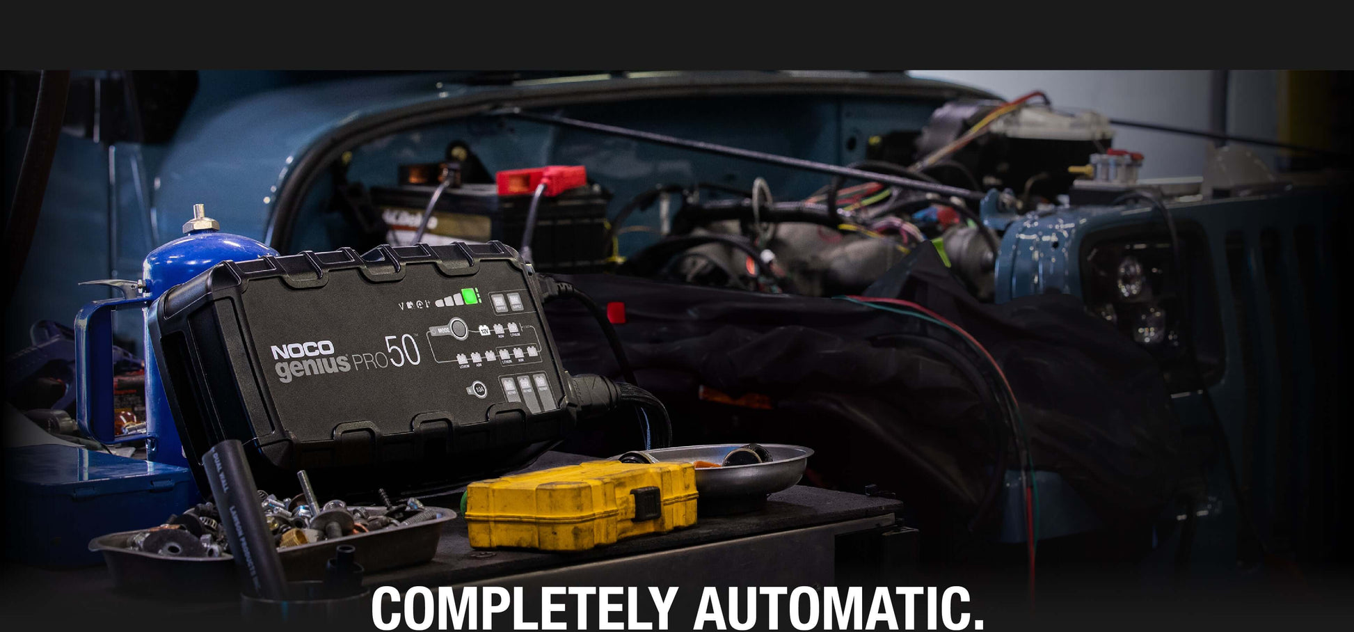 NOCO GENIUSPRO50 50A Pro Battery Charger in automotive setup at Cabin Depot.