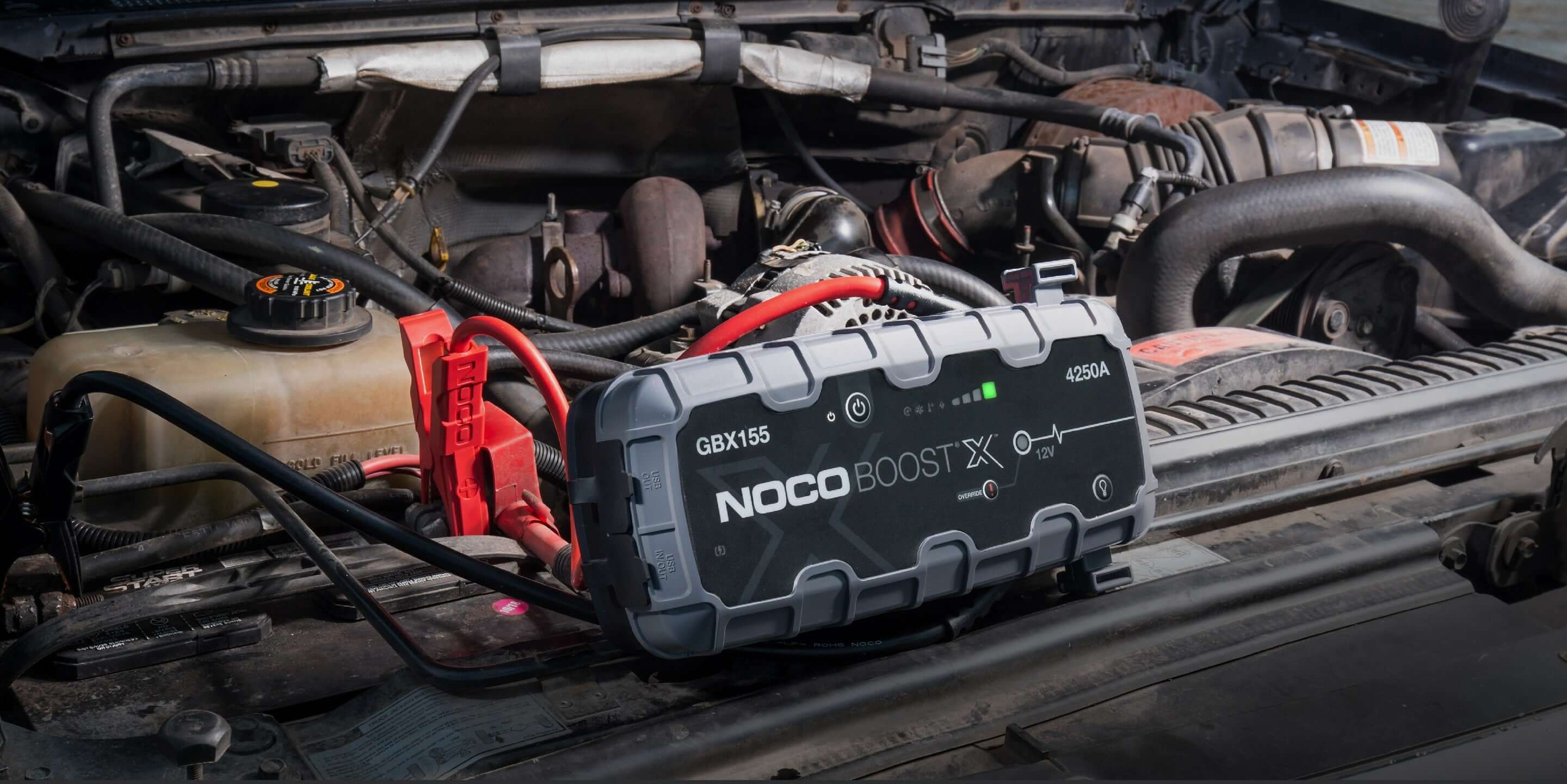 NOCO 12V 4250A Boost X Jump Starter in action, powerful engine start, ideal for vehicles, available at Cabin Depot.