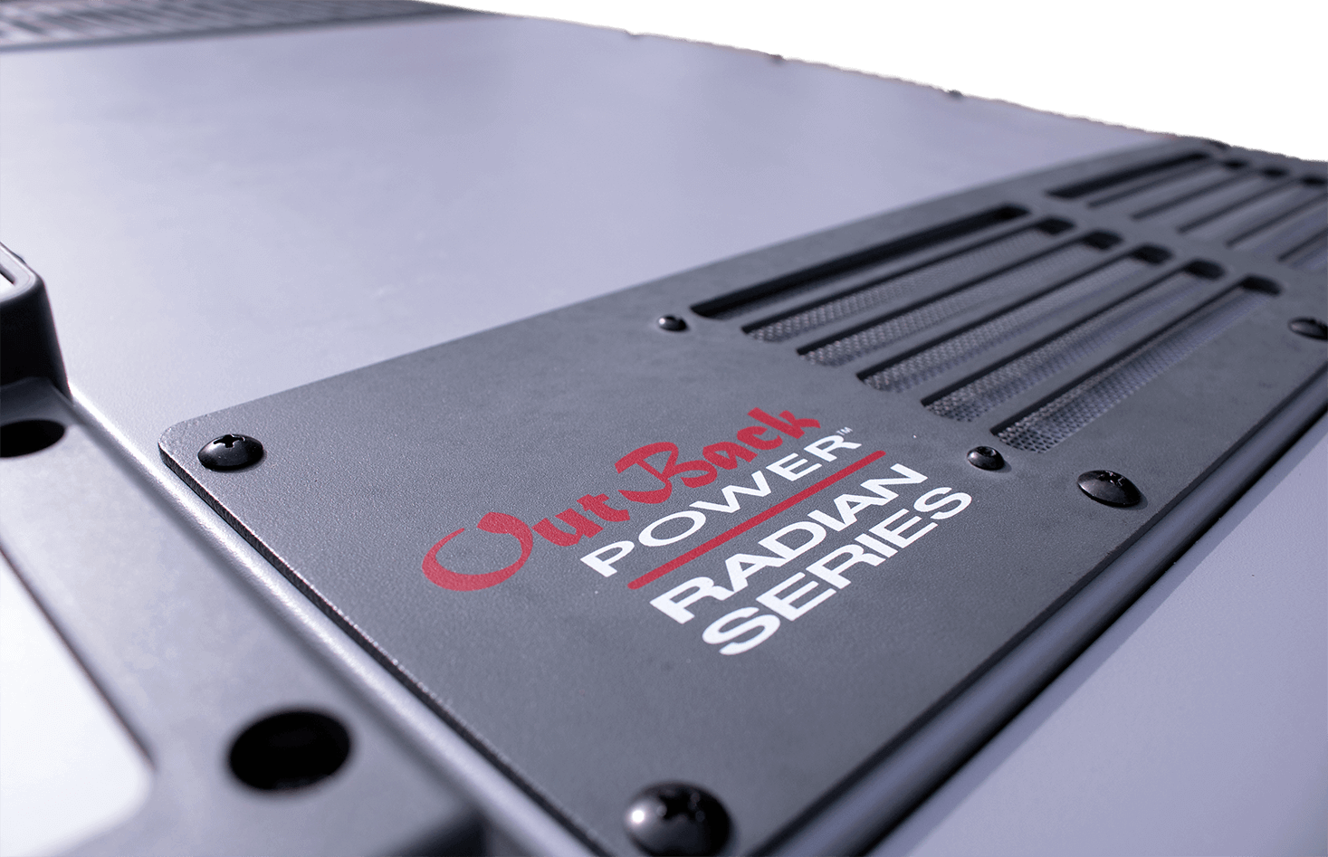 Close-up of OutBack Power Radian Series inverter, featured in Cabin Depot's FLEXpower 8000 Watt Pre-Wired System.