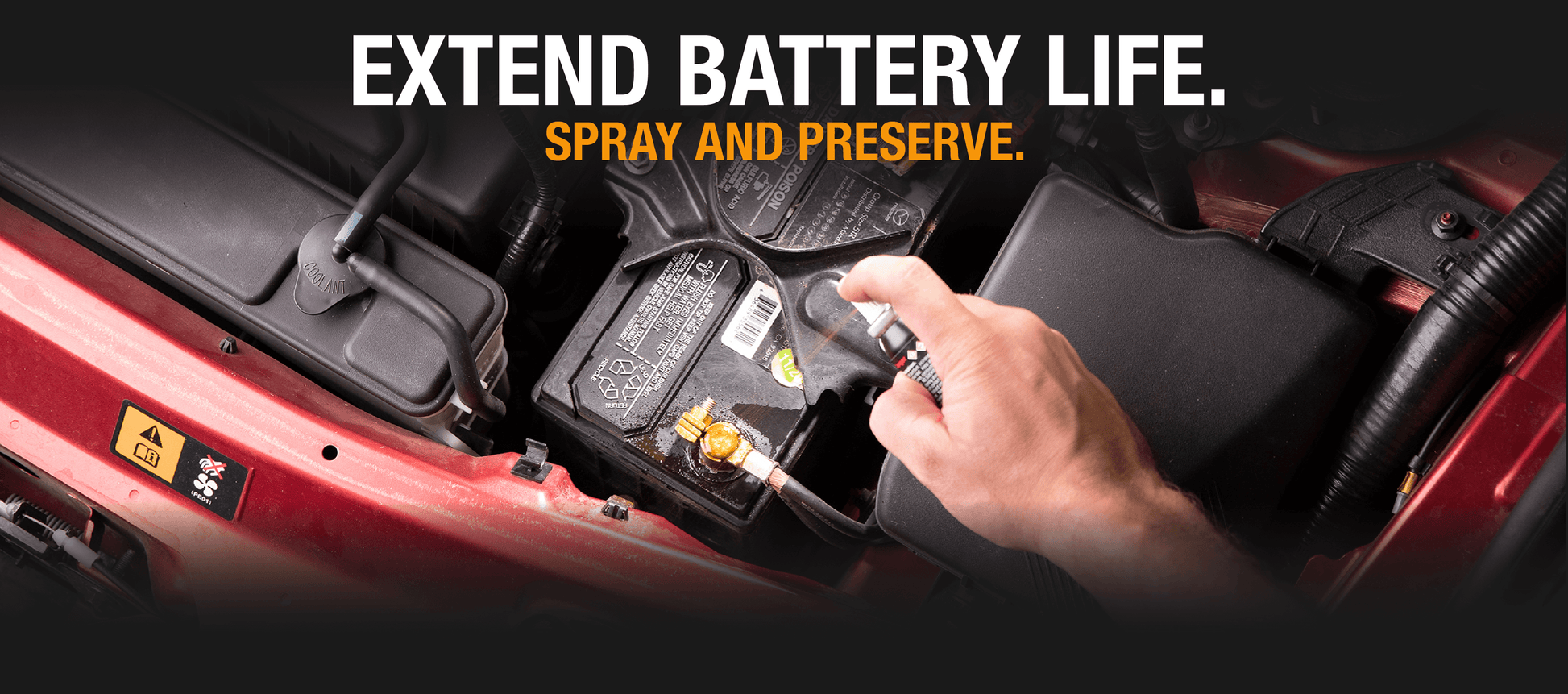 Applying NOCO Battery Terminal Treatment Kit to car battery to prevent corrosion. Available at Cabin Depot.