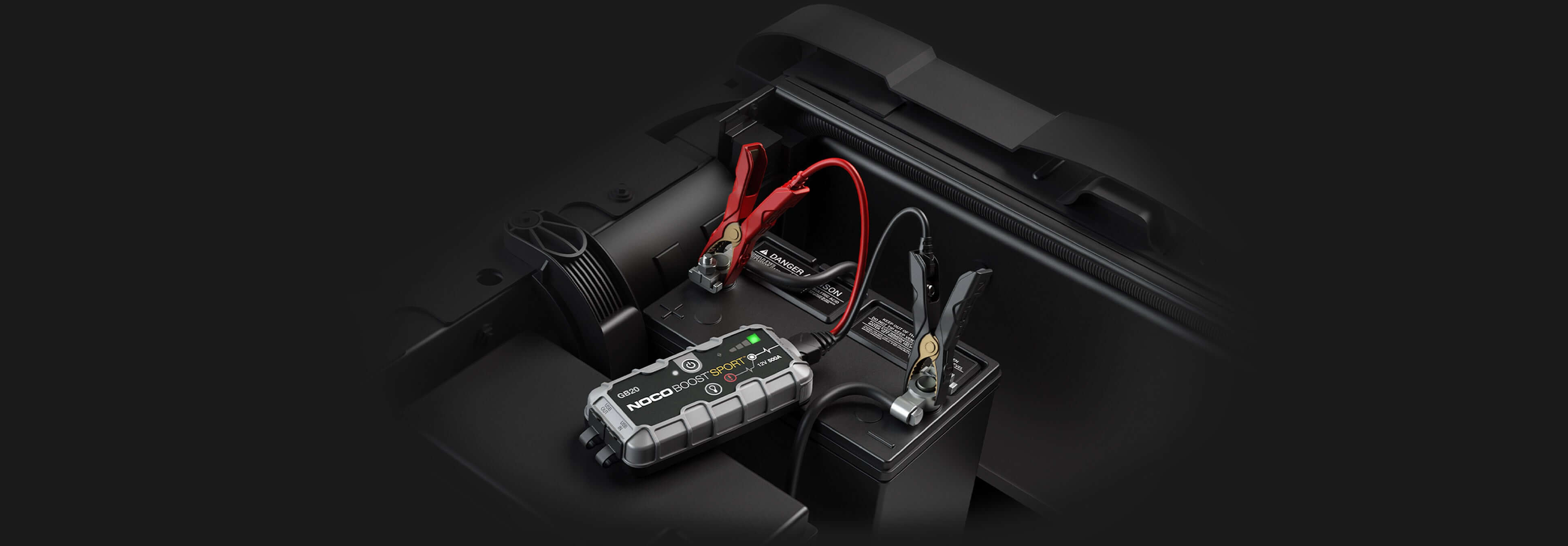 NOCO 12V 500A Boost Jump Starter in action from Cabin Depot, featuring spark-proof technology and reverse polarity protection.