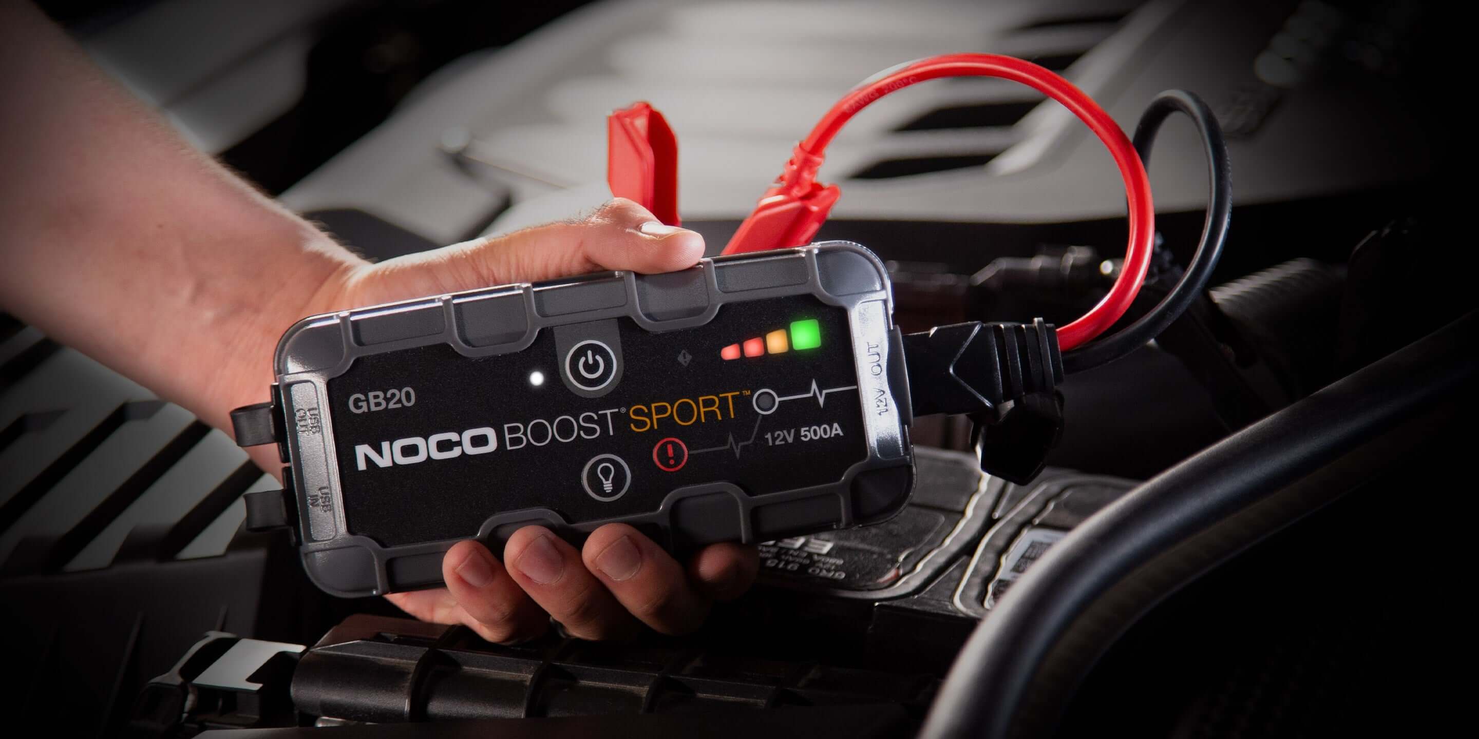 NOCO GB20 12V 500A Boost Jump Starter in use, featuring spark-proof connections and reverse polarity protection. Available at Cabin Depot.