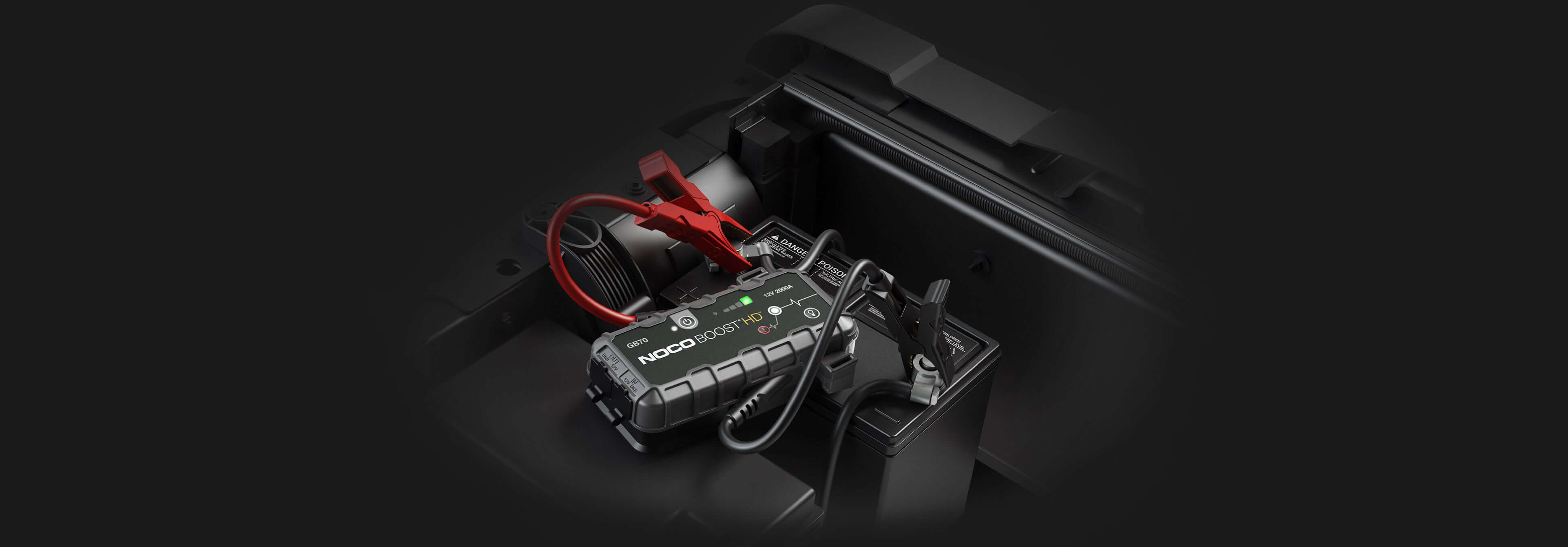 NOCO 12V 2,000A Boost Jump Starter GB70 in use - Cabin Depot. Portable lithium-ion battery with safety features for dead battery jump-starting.
