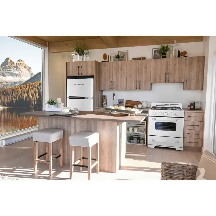 Modern kitchen with Unique 14 Cu/Ft Classic Retro Solar DC Fridge from Cabin Depot, showcasing sleek mid-century design in off-grid setting.