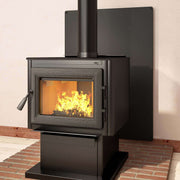 Imperial 36" x 48" Black Pebble Stove Board protecting a wood stove, ideal for ember protection, available at Cabin Depot.