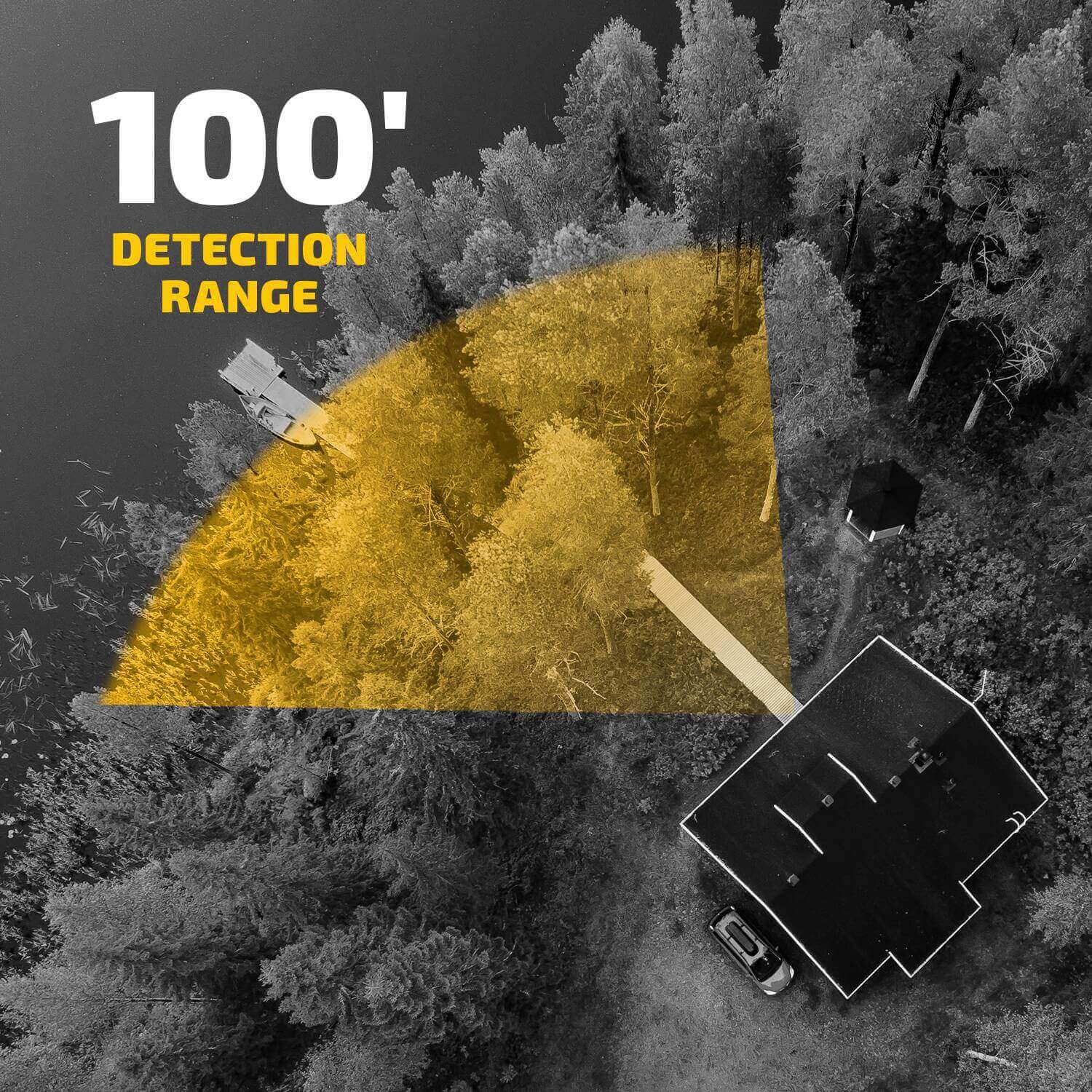 Aerial view of woodland area showing 100-foot detection range of security camera by a cabin, highlighting coverage for The Cabin Depot.