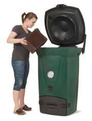 Woman using Biolan 220 ECO Composter for efficient kitchen and toilet waste composting.