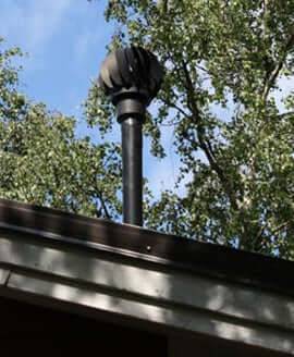 Biolan Aluminum Turbine Vent installed on cabin roof for efficient off-grid ventilation, available at Cabin Depot.