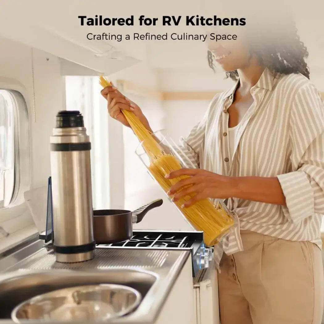 Woman using Camplux 12" 2 Burner Propane RV Cooktop in RV kitchen, promoted by Cabin Depot for travel convenience and healthy cooking.