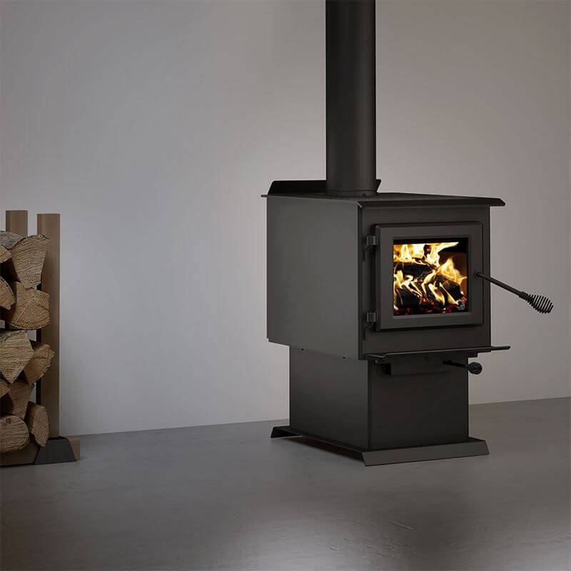 Century S250 Wood Stove with stainless steel heat protector, available at Cabin Depot. Features EPA 2020 certification and non-catalytic system.