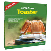 Coghlans Camp Stove Toaster packaging showing toaster with four slices of bread, available at Cabin Depot.