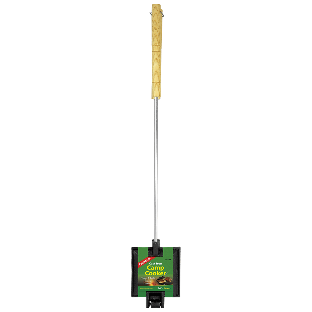 Coghlan's Cast Iron Camp Cooker with wooden handles, ideal for outdoor cooking at Cabin Depot. Durable, pre-seasoned, and easy to clean.