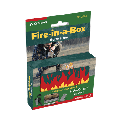 Coghlans Fire-In-A-Box kit packaging, featuring tools for starting fires; available at Cabin Depot for campers and hikers.