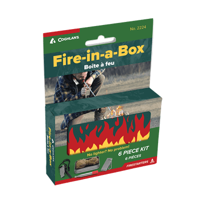 Coghlan's Fire-in-a-Box kit packaging showing six-piece fire-starting essentials for camping and hiking.