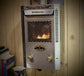 Newport Explorer Propane Fireplace Heater by Dickinson Marine in use, showcasing compact design for RVs and cabins.