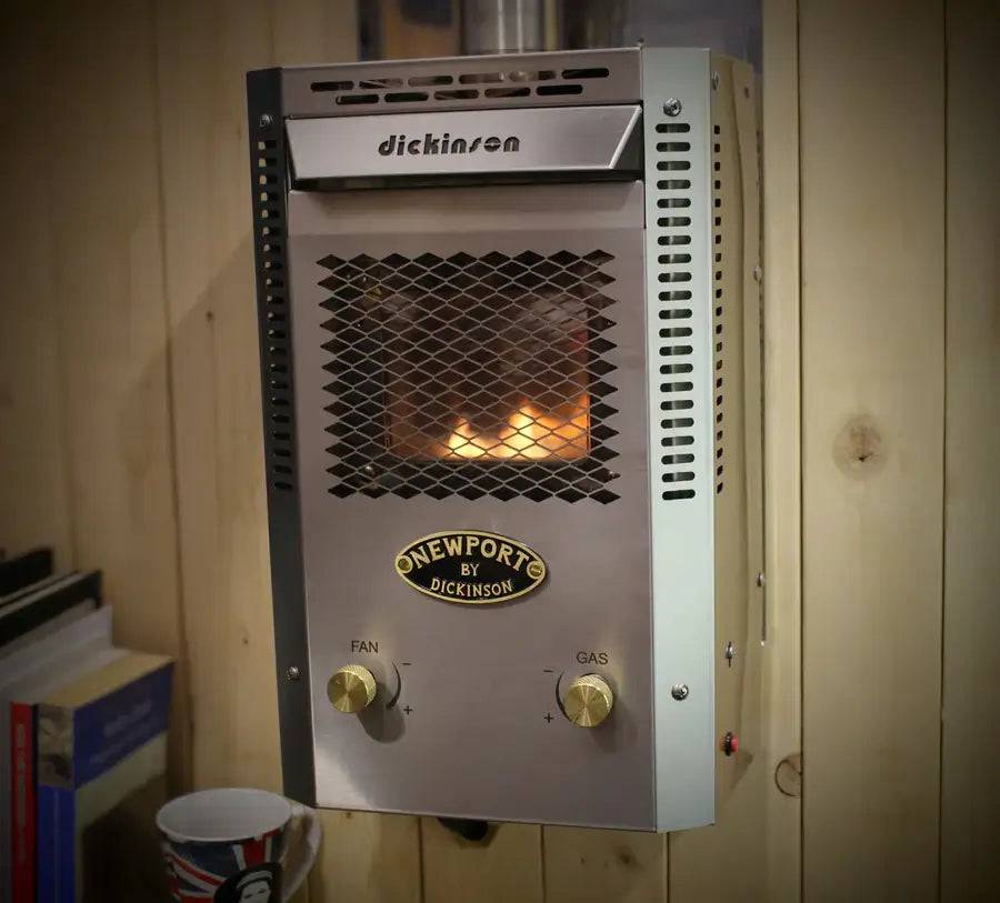 Newport Explorer Propane Fireplace Heater by Dickinson Marine, perfect for cabins, RVs, and boats. Available at Cabin Depot.