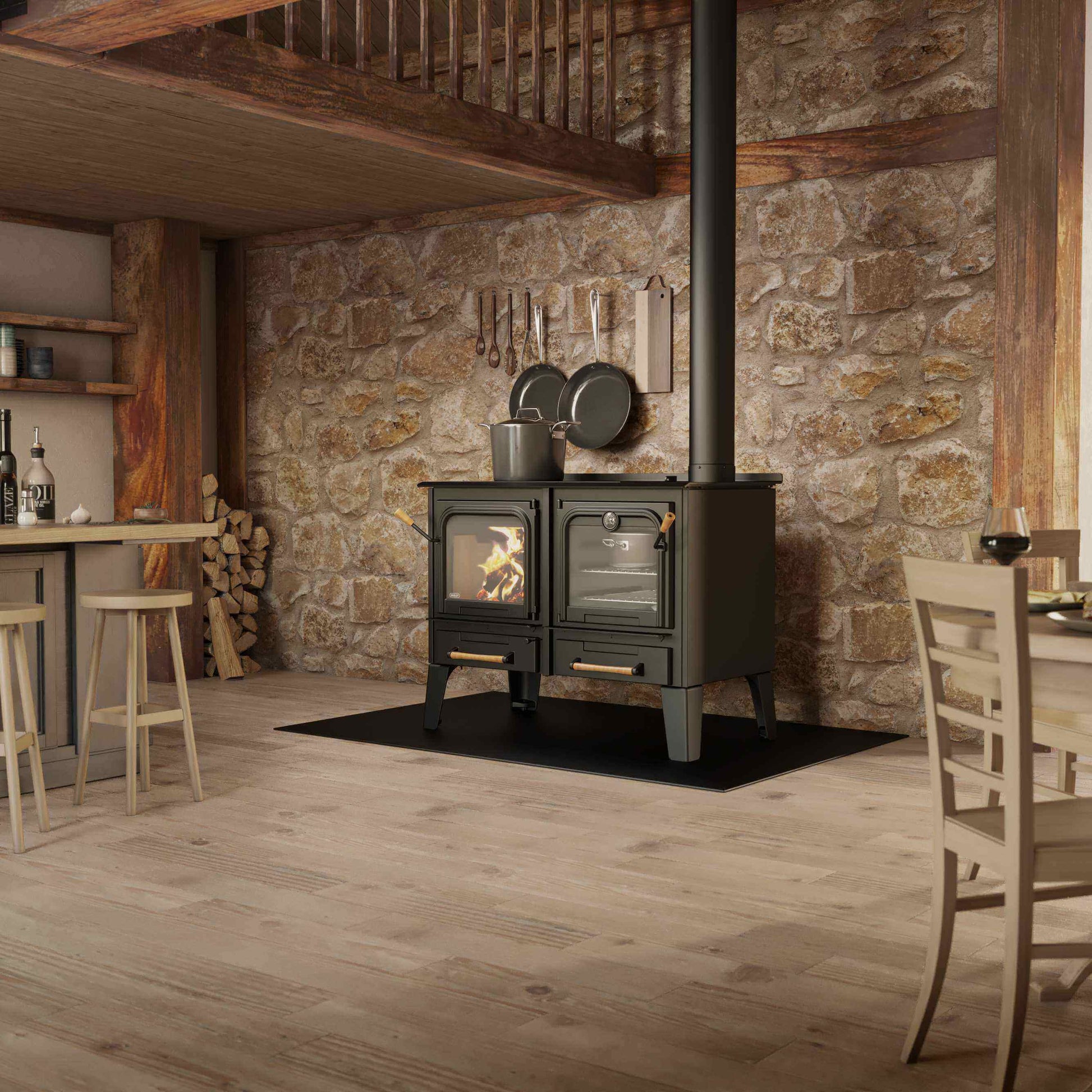 Drolet Chic-Choc wood-burning cookstove in rustic cabin kitchen, available at Cabin Depot.