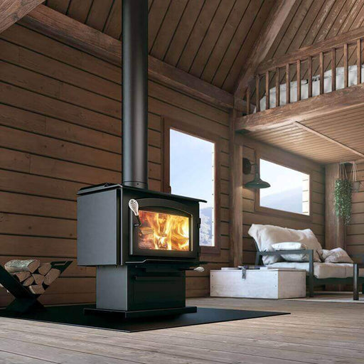 Drolet Escape 1800 Wood Stove in cozy cabin setting, showcasing large firebox and sleek design for efficient heating.