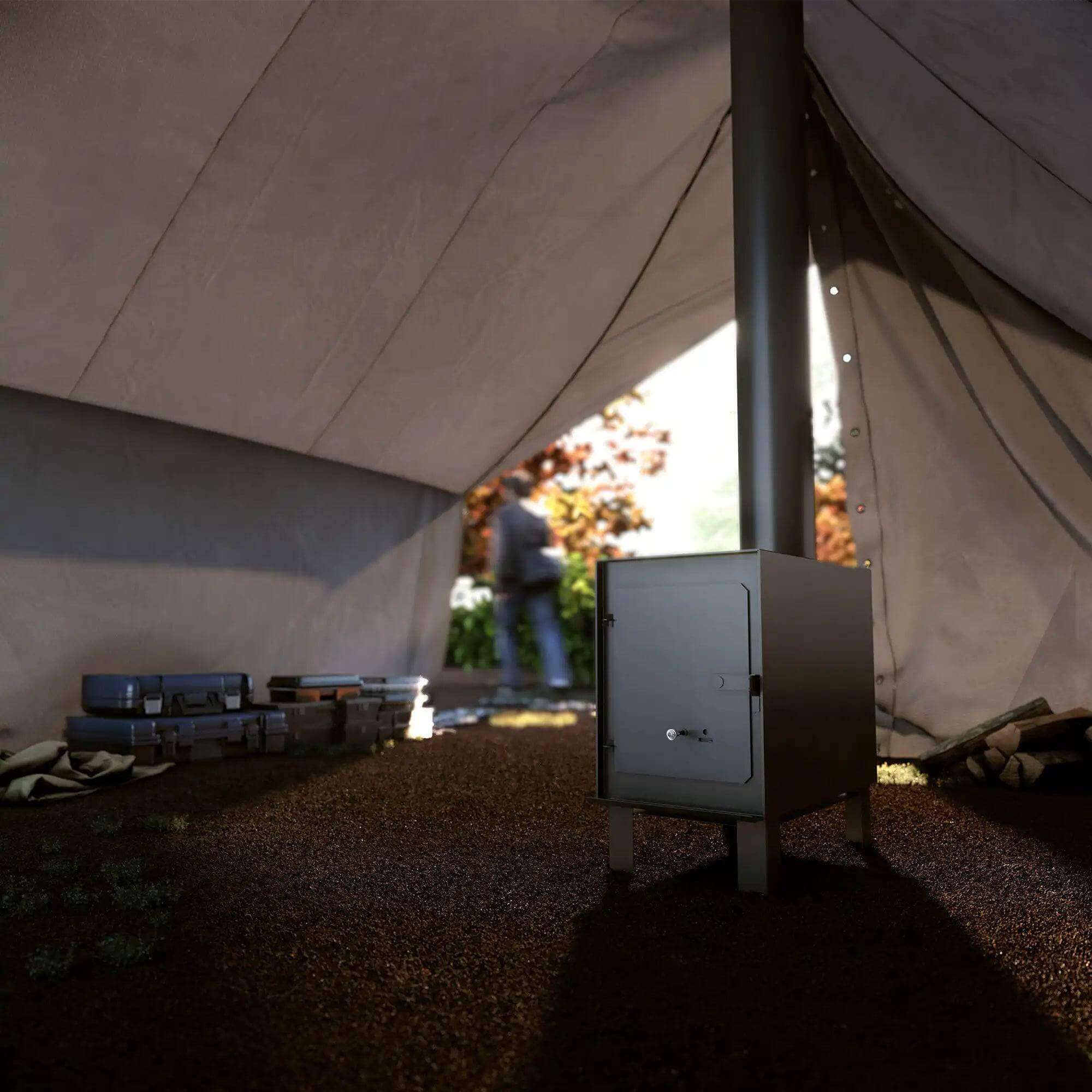 Drolet Hunter Camp Stove displayed inside a tent, showcasing its compact design for easy transport by Cabin Depot.