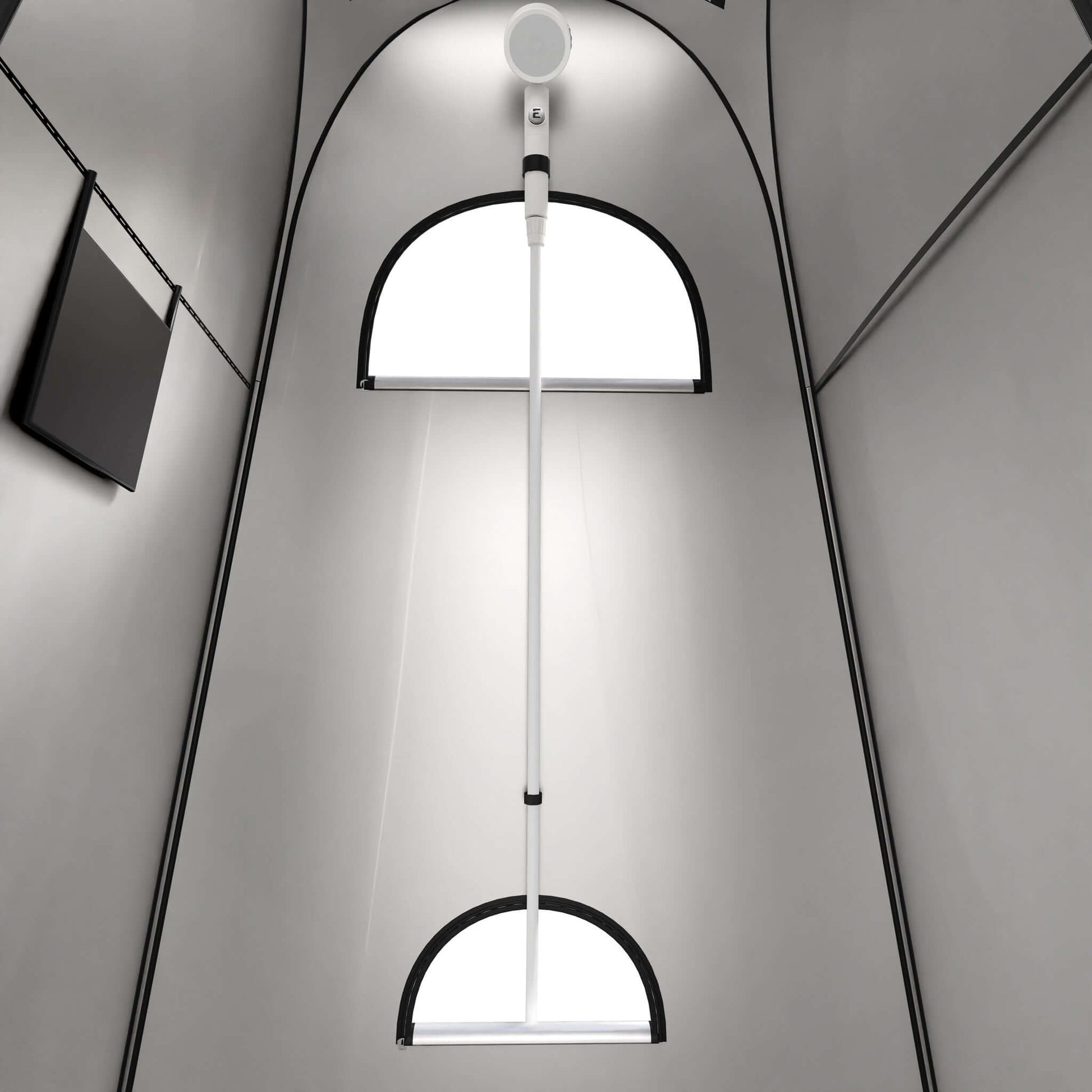 Interior view of Ecco Tent by Cabin Depot, featuring setup for Eccotemp Portable Water Heater and Spray Showerhead for camping convenience.