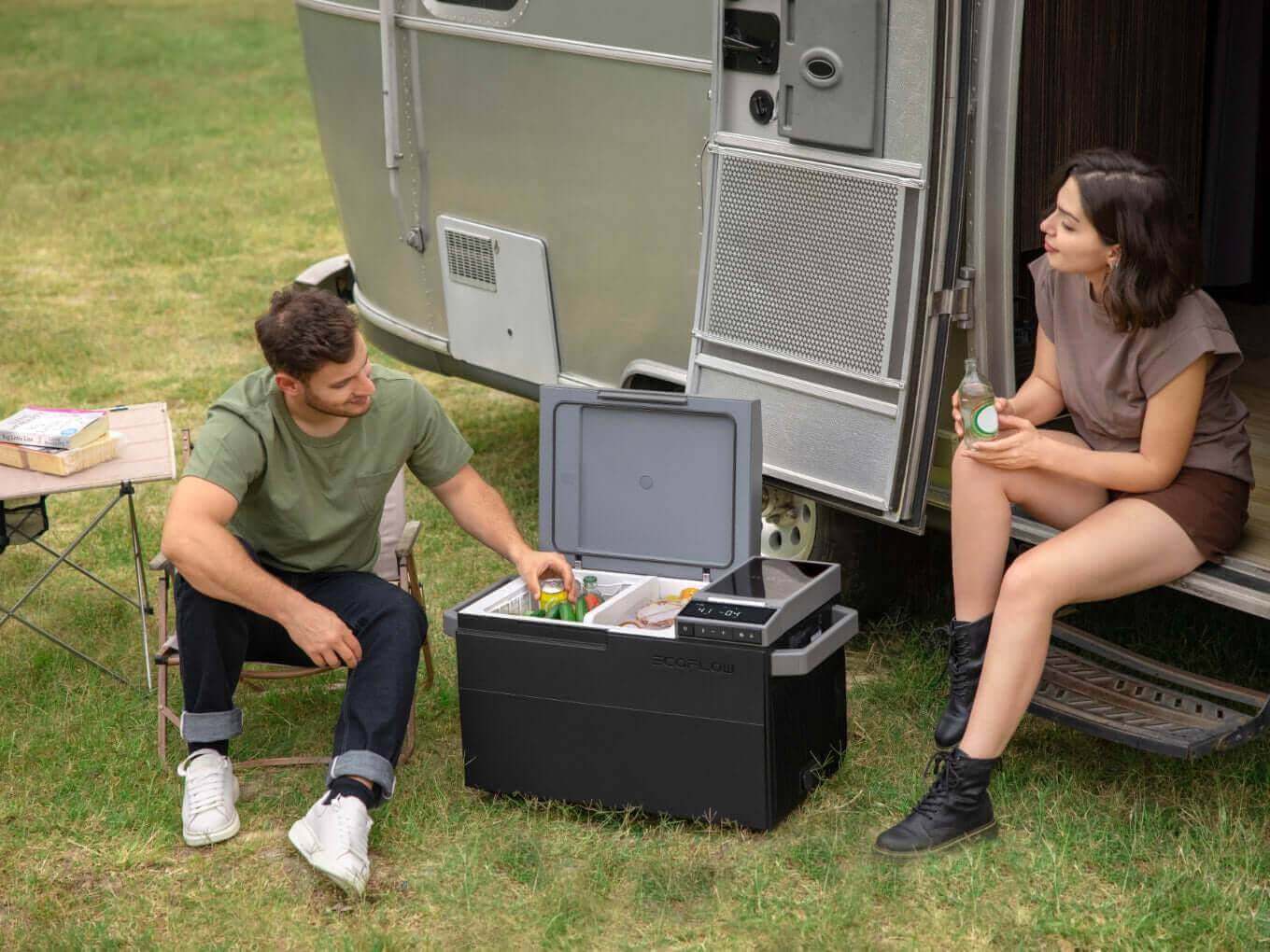EcoFlow GLACIER 3-in-1 fridge/freezer/ice-maker used outdoors, showcasing portability and features, available at Cabin Depot
