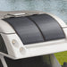 EcoFlow 100W Flexible Solar Panel mounted on a van roof, showcasing its lightweight and curved design for efficient solar energy.