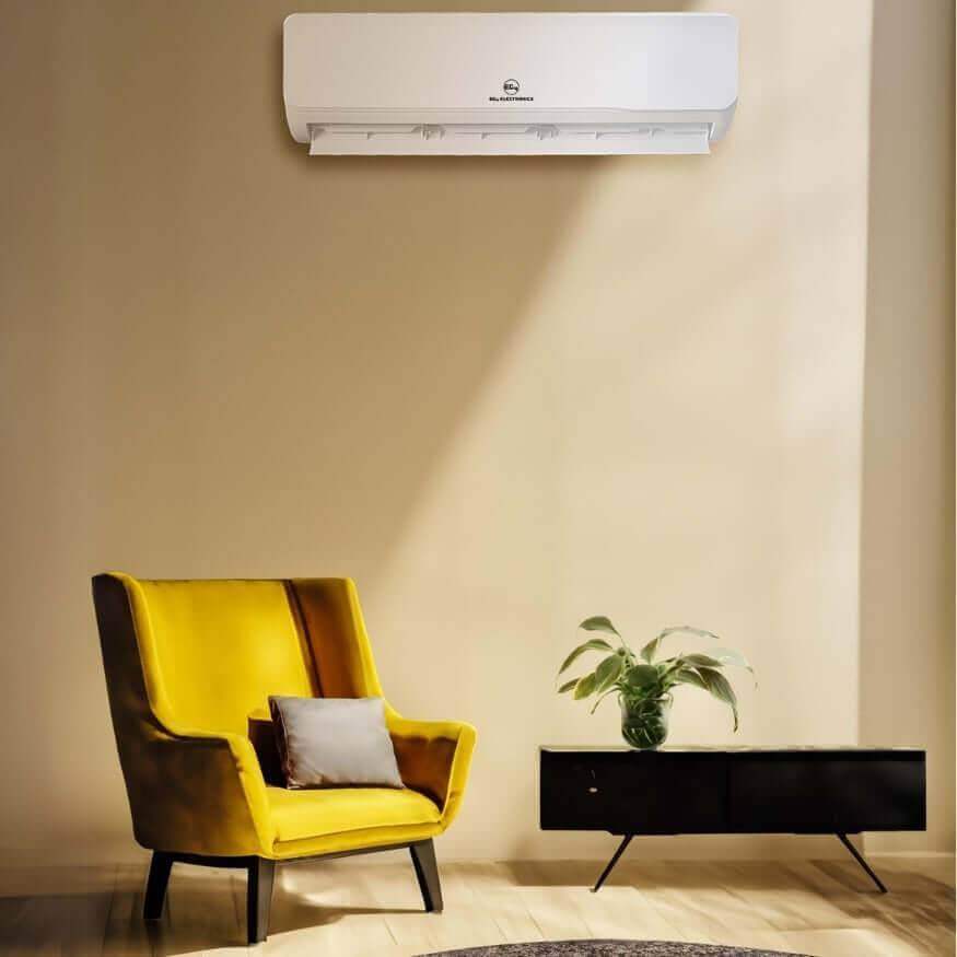 Stylish living room with EG4 12,000 BTU Hybrid AC/DC Mini Split on wall, yellow chair, and black console, available at Cabin Depot.