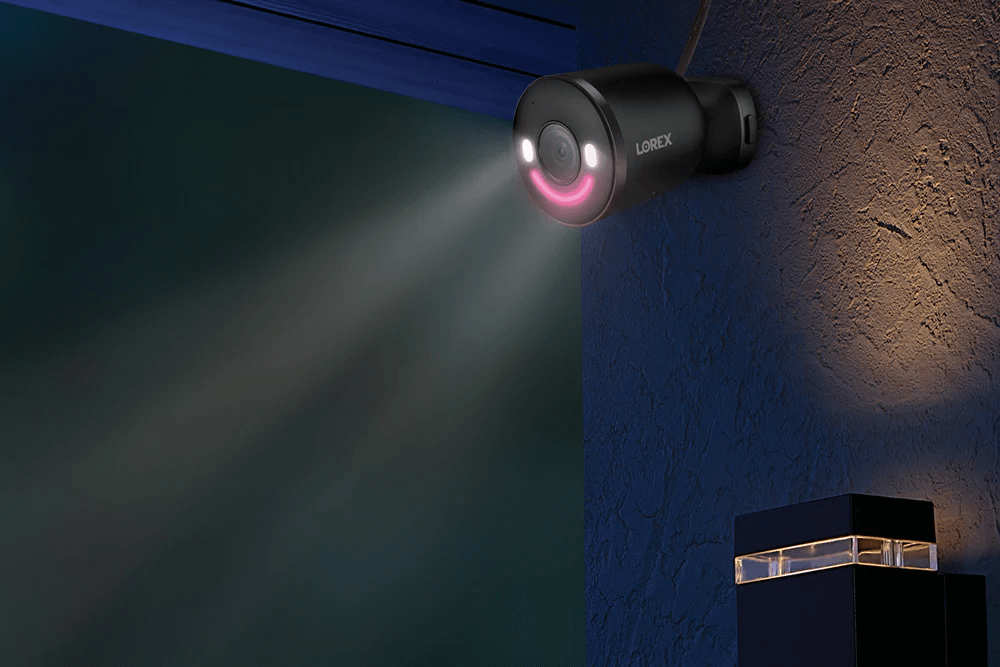 Lorex 4K Spotlight Wi-Fi Camera mounted outdoors, featuring built-in spotlight and smart detection, available at Cabin Depot for security needs.