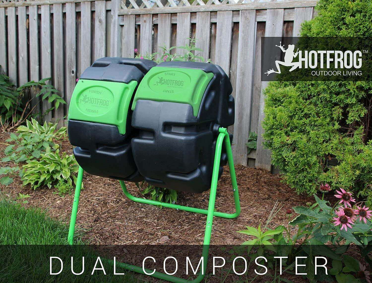 FCMP Outdoor HOTFROG Dual Body Tumbling Composter in garden, available at Cabin Depot, showcases dual chamber composting design.