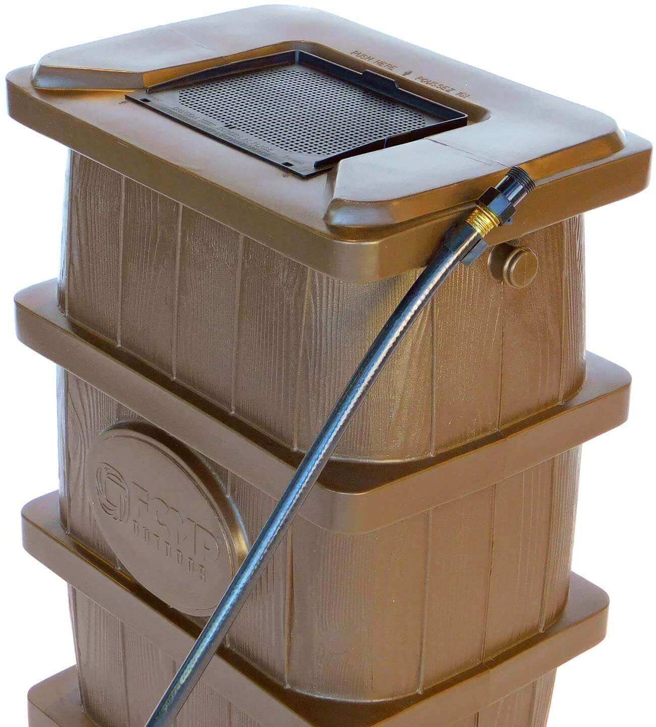 FCMP Outdoor 45Gal Wood Grain Rain Barrel in brown with safety rib design, perfect for cabin use. Made in Canada, sold by Cabin Depot.