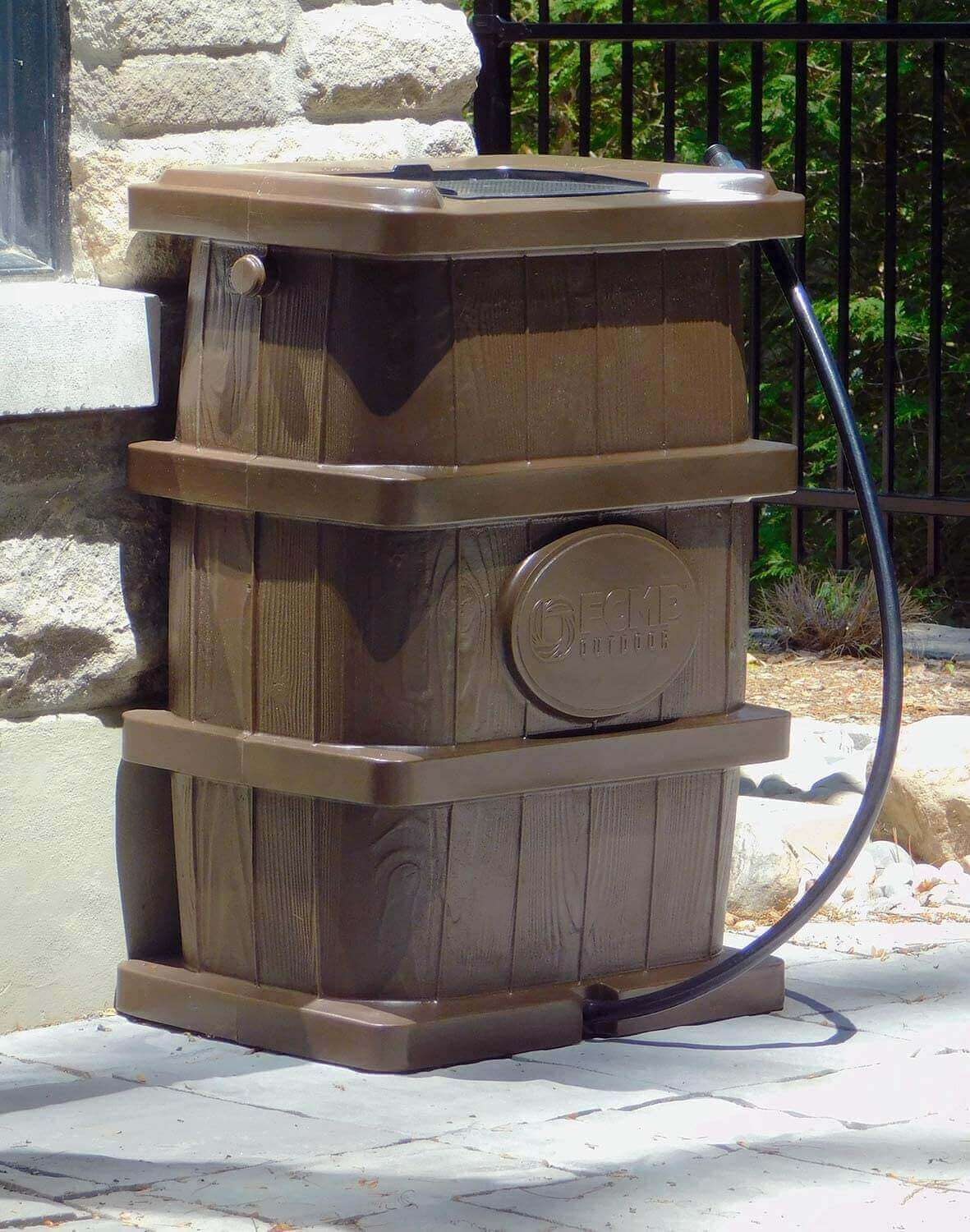 FCMP Outdoor 45Gal Wood Grain Rain Barrel in Brown, available at Cabin Depot. Made in Canada, ideal slim design for limited spaces.