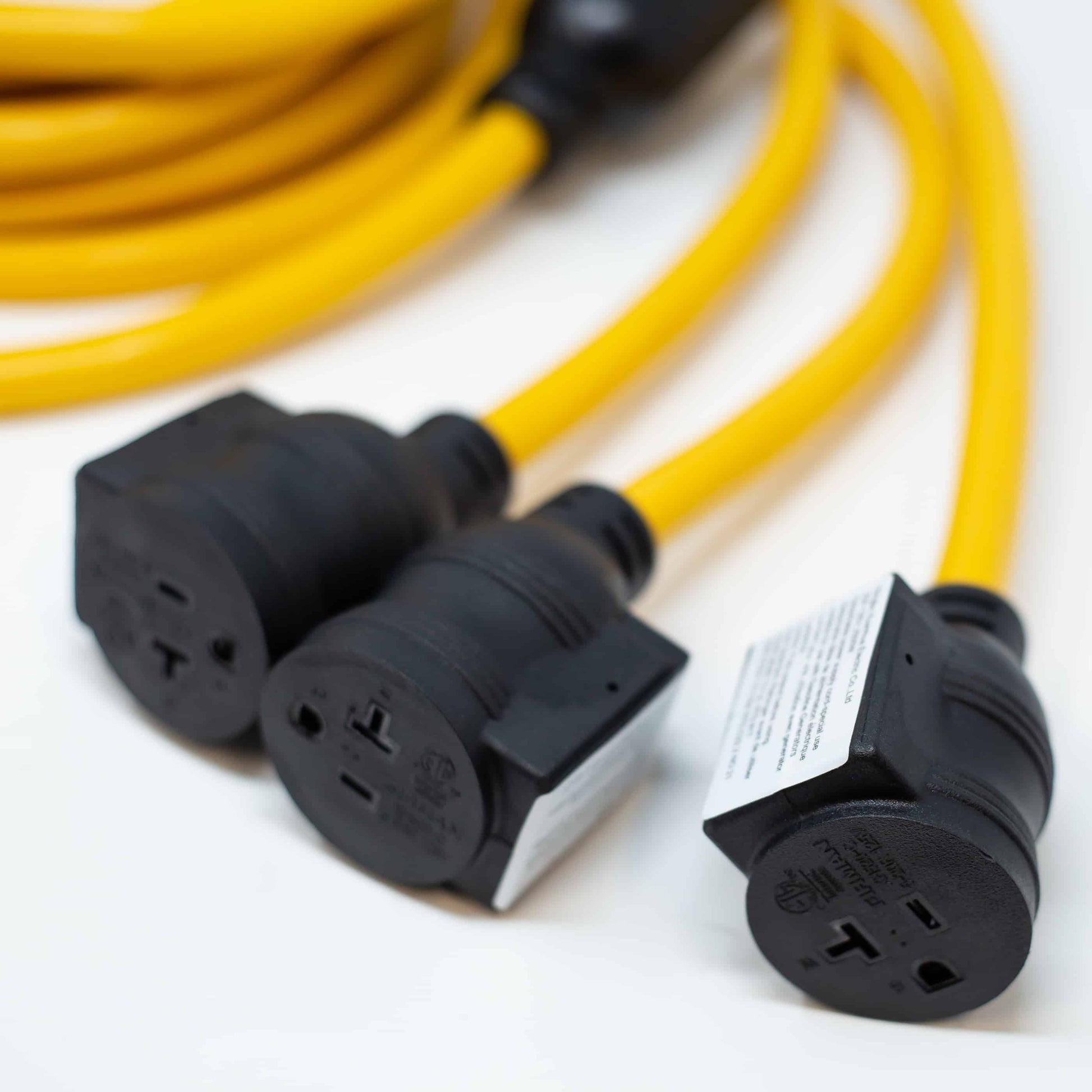 Firman 30A TT-30P to 5-20RX3 power cord, 10 gauge, 25FT, outdoor-rated, with split outlets and circuit breakers, available at Cabin Depot.