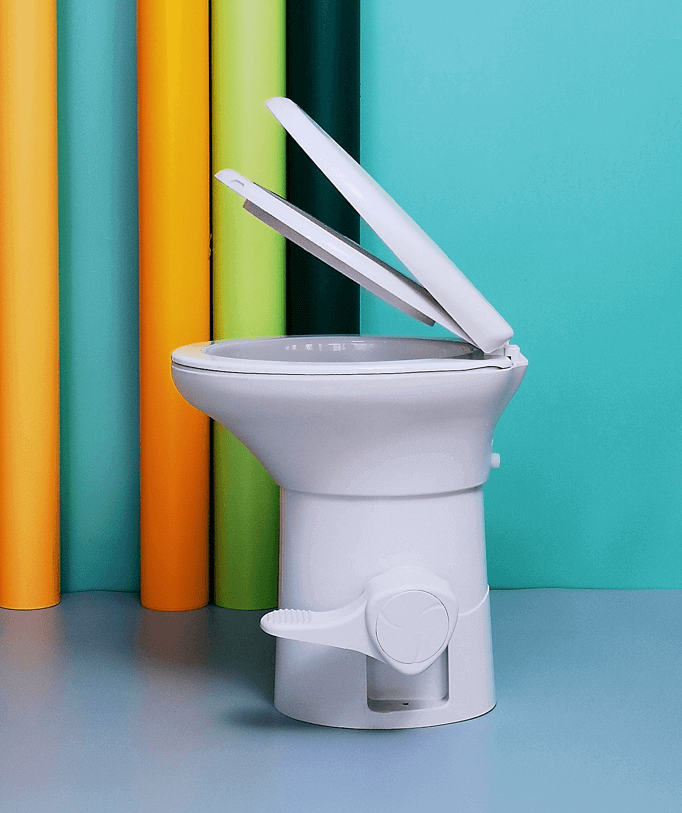 HomeStead Appliance RV Toilet with enamel coating, soft-close lid, ideal for RVs and boats. Available at Cabin Depot.