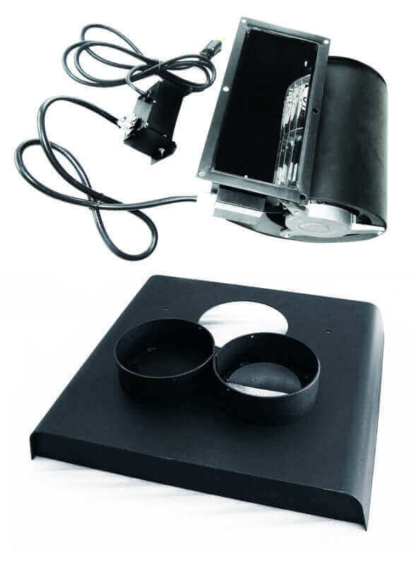 Components of J.A. Roby Master Wood Stove from Cabin Depot, including blower and dual duct connections for efficient heating.