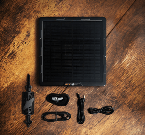 Spypoint SPLB-10 Lithium Solar Panel with Accessories on Wooden Surface