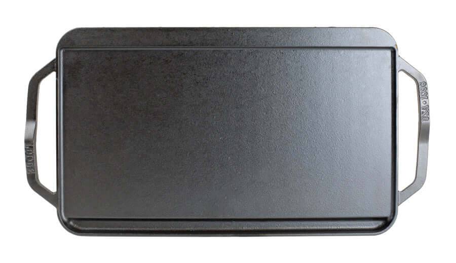 Lodge 19.5 x 10 inch reversible cast iron grill griddle with handles, available at Cabin Depot, ideal for versatile cooking.
