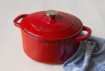 Lodge 5.5 Quart Enameled Cast Iron Dutch Oven - Red, perfect for broiling, braising, and roasting, available at Cabin Depot.