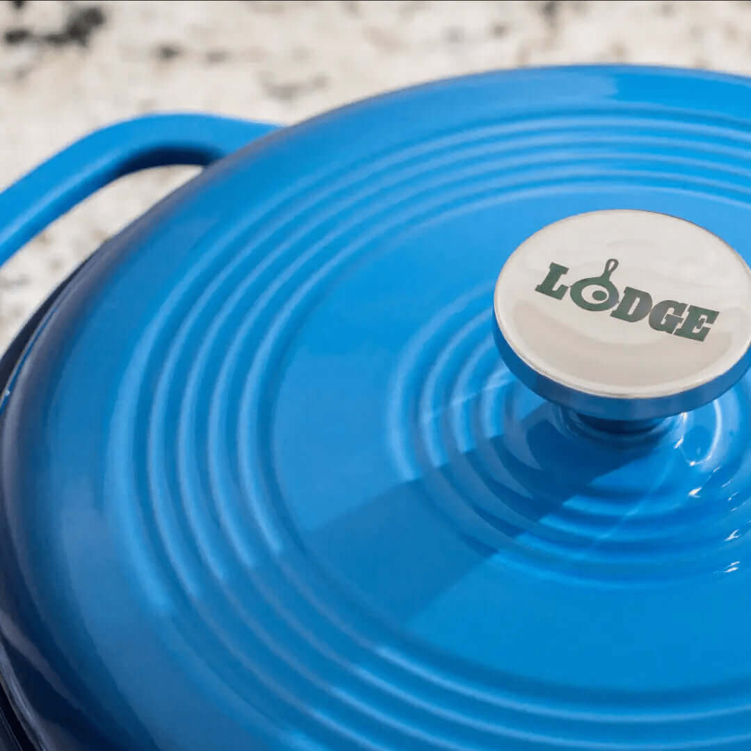 Lodge 6 Quart Enameled Cast Iron Dutch Oven - Blue lid close-up, available at Cabin Depot, durable for baking and stovetop cooking.