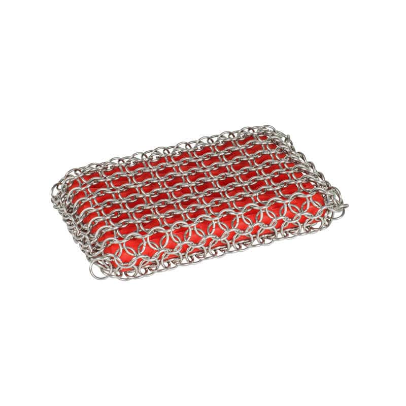 Lodge chainmail scrubbing pad with silicone insert, perfect for cleaning cast iron cookware. Available at Cabin Depot.