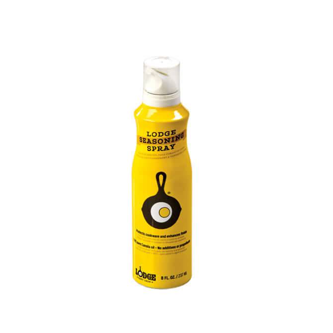 Lodge Seasoning Spray for cast iron cookware, 8 oz. canola oil, available at Cabin Depot for enhancing and protecting cookware finish.