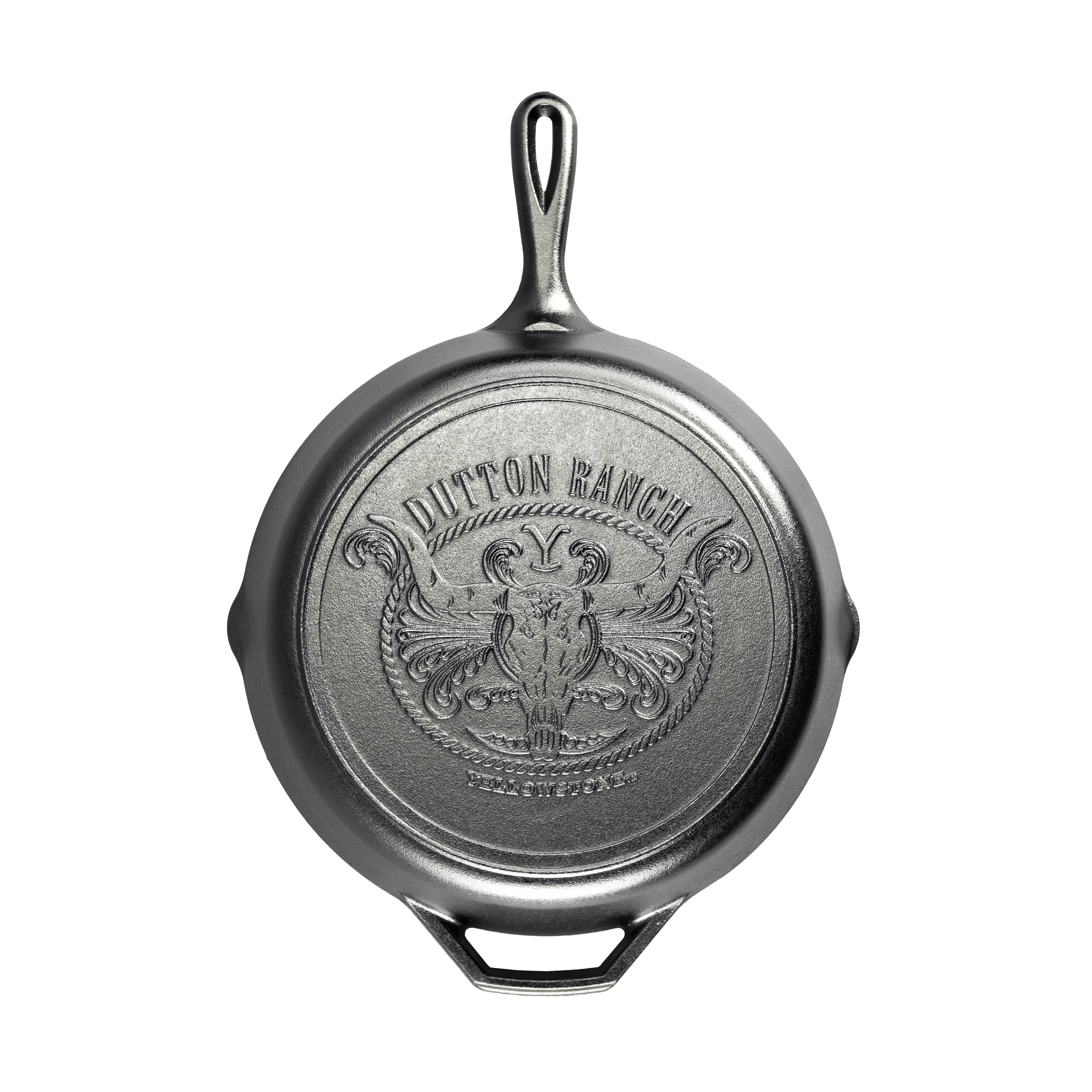 Lodge 12-inch Yellowstone cast iron steer skillet with Dutton Ranch design, available at Cabin Depot, ideal for rustic cooking and gifting.