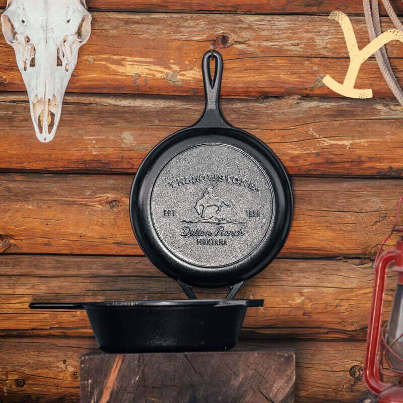 Lodge Yellowstone Seasoned Cast Iron Combo Cooker with bucking bronco design available at Cabin Depot.