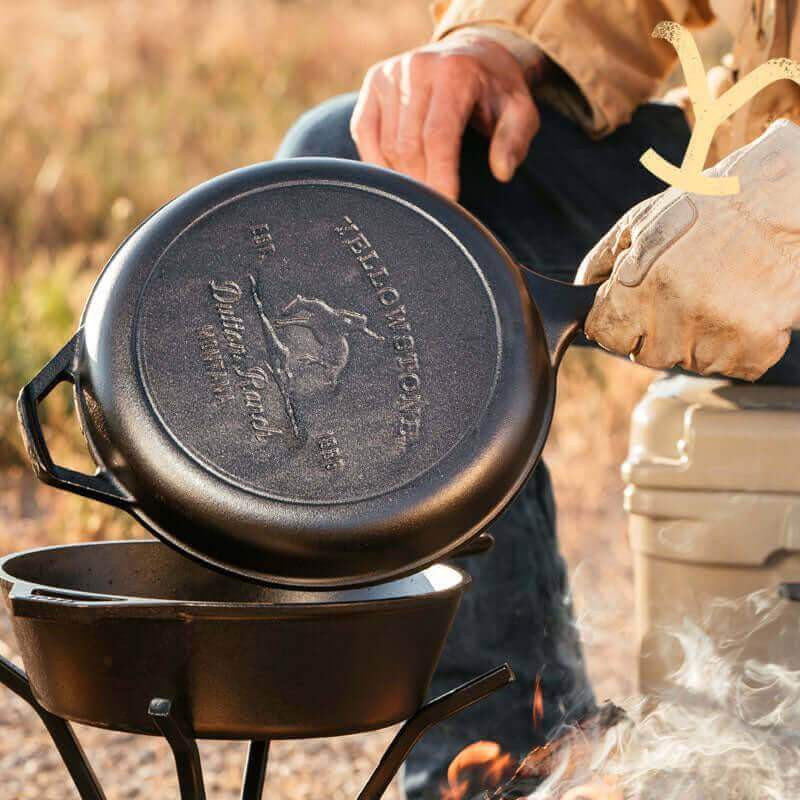 Lodge Yellowstone seasoned cast iron combo cooker with bucking bronco design, ideal for Cabin Depot enthusiasts seeking adventure cookware.