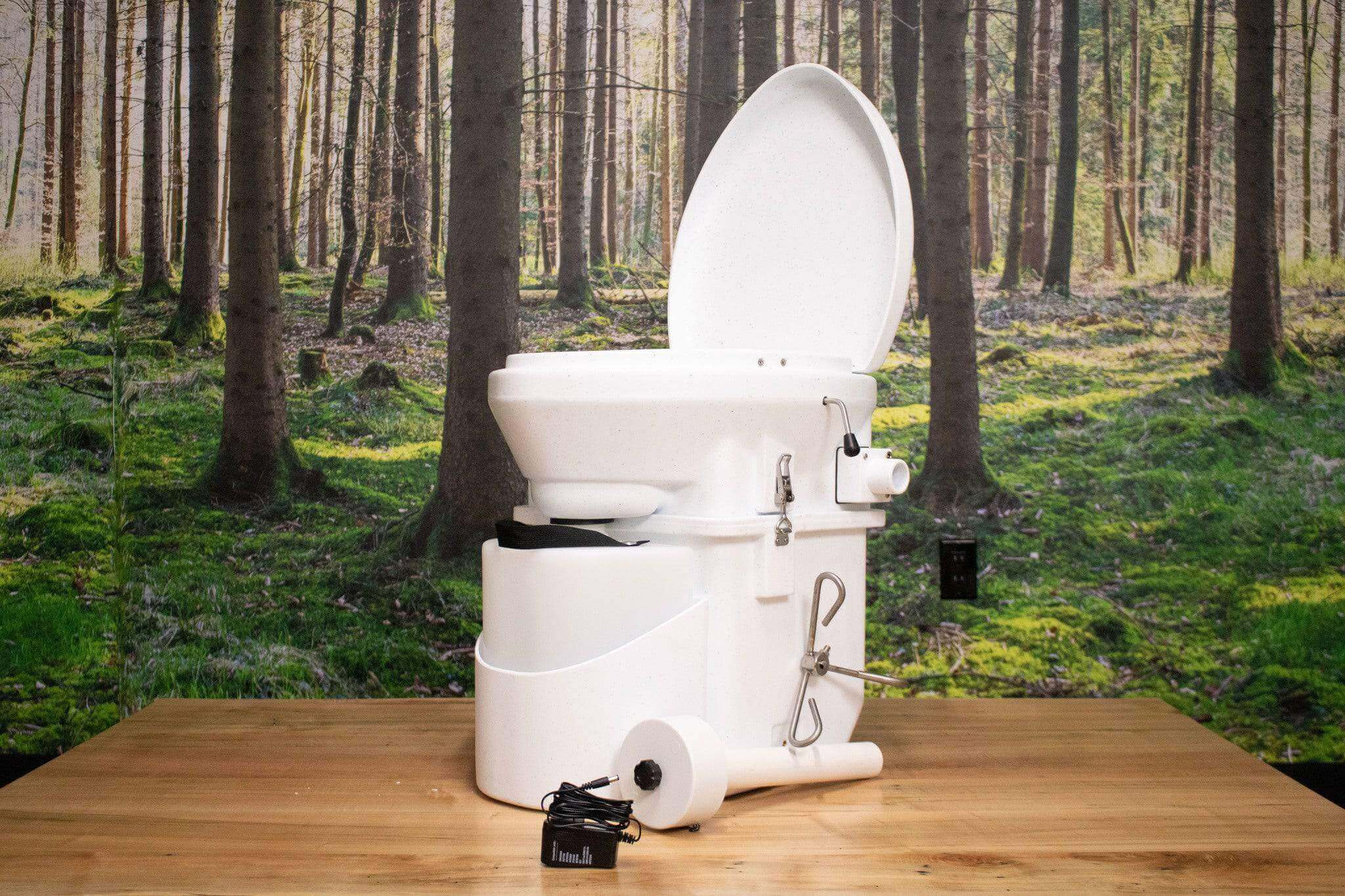 Nature's Head Composting Toilet with Spider Handle available at Cabin Depot, ideal for off-grid living. Includes 12V plug and free shipping in Canada.